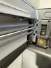 Bambu Lab P2S filament cutter stopper installed inside the printer chamber; in-use placement context.