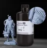 ELEGOO Standard Resin V2.0 Grey 1KG bottle with detailed gray printed miniature, in-use detail showcase