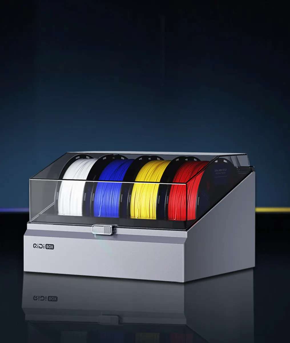 Standalone QIDI Box filament unit showing four colored filament spools
