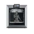 QIDI Plus4 shown with a detailed completed 3D print inside the build chamber; official use/context image on white.