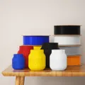 ELEGOO RAPID PETG application image showing finished 3D-printed decorative objects with filament spools