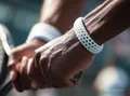 White flexible 3D-printed wristband in use, official ELEGOO Rapid TPU 95A application image