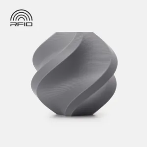 Bambu Lab PETG Matte Gray (35102), 1 kg variant: gray printed spiral vase on a neutral background with RFID graphic. Best verified gray-specific image; depicts a print sample, not the filament spool.